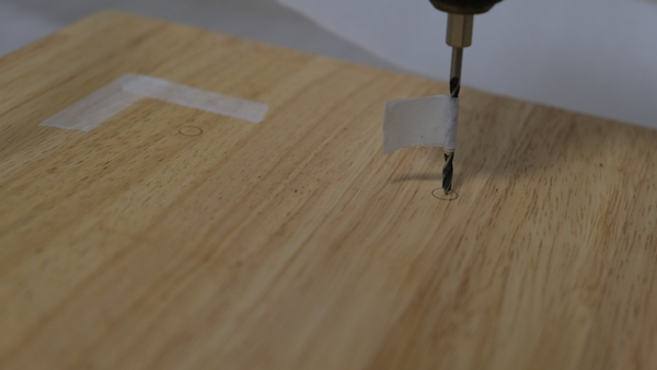 drilling on a board